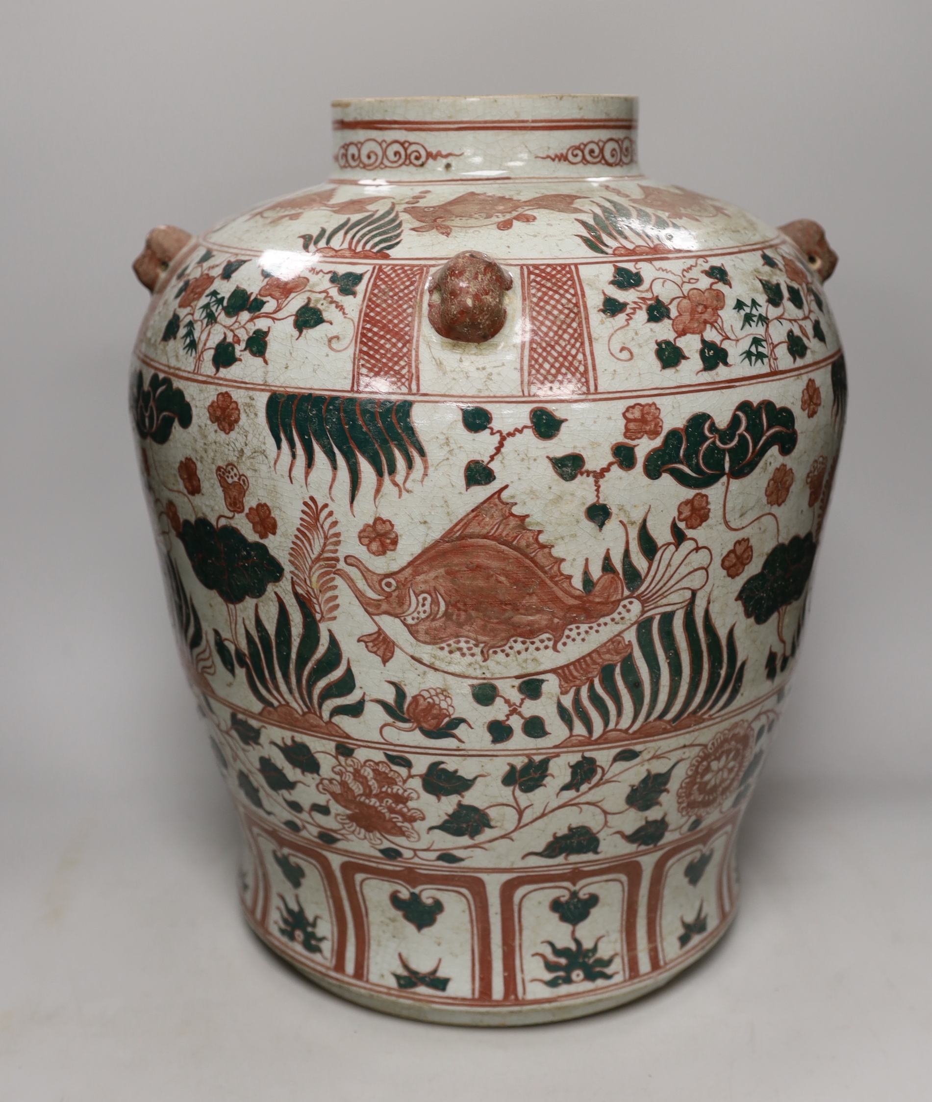 An Annamese enamelled porcelain ‘fish’ jar, 43cm high